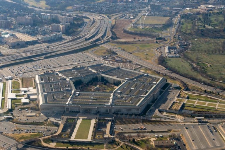 a view of The Pentagon with a mountain in the background