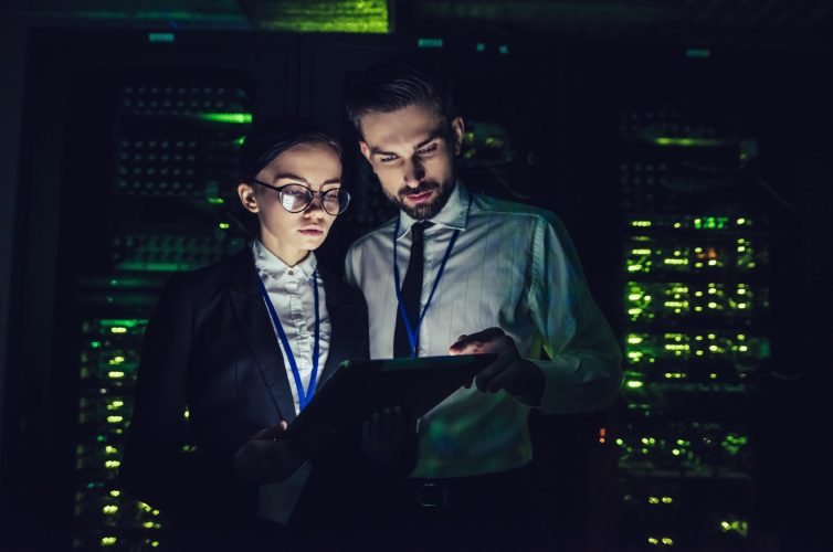 Employees using the RegDOX View & Editing Tool on a tablet within a secure server environment to access and process sensitive documents